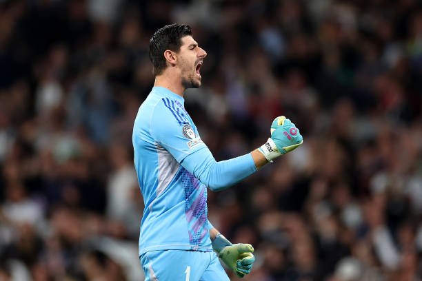 MADRID, SPAIN - FEBRUARY 19: Thibaut Courtois of Real Madrid celebrates after Kylian Mbappe (not pictured) scored his sides third goal and his hat trick during the UEFA Champions League 2024/25 League Knockout Play-off second leg match between Real Madrid C.F. and Manchester City at Santiago Bernabeu Stadium on February 19, 2025 in Madrid, Spain. (Photo by Florencia Tan Jun - UEFA/UEFA via Getty Images)