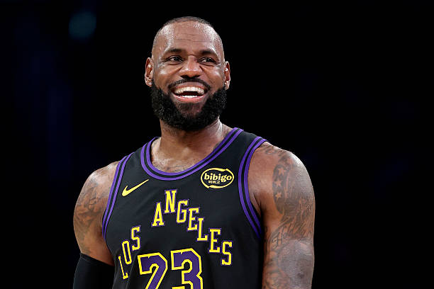 LOS ANGELES, CALIFORNIA - NOVEMBER 18: LeBron James #23 of the Los Angeles Lakers reacts against the Utah Jazz during the second quarter at Crypto.com Arena on November 18, 2025 in Los Angeles, California. NOTE TO USER: User expressly acknowledges and agrees that, by downloading and or using this photograph, User is consenting to the terms and conditions of the Getty Images License Agreement. (Photo by Ronald Martinez/Getty Images)