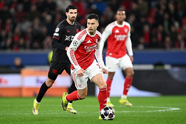 LEVERKUSEN, GERMANY - MARCH 11: Gabriel Martinelli of Arsenal runs with the ball during the UEFA Champions League 2025/26 Round of 16 First Leg match between Bayer 04 Leverkusen and Arsenal FC at BayArena on March 11, 2026 in Leverkusen, Germany. (Photo by Stuart MacFarlane/Arsenal FC via Getty Images)