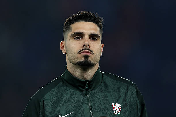 Pedro Neto of Chelsea looks on as he lines up prior to the UEFA Champions League 2025/26 Round of 16 First Leg match between Paris Saint-Germain FC and Chelsea FC at Parc des Princes on March 11, 2026 in Paris, France. (Photo by Chris Lee - Chelsea FC/Chelsea FC via Getty Images)