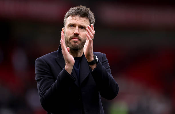 Michael Carrick, Manager of Manchester United, acknowledges the fans after the Premier League match between Manchester United and Aston Villa at Old Trafford on March 15, 2026 in Manchester, England. (Photo by Lewis Storey/Getty Images)